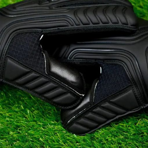 Close-up of glove texture showing rubber detailing on green turf